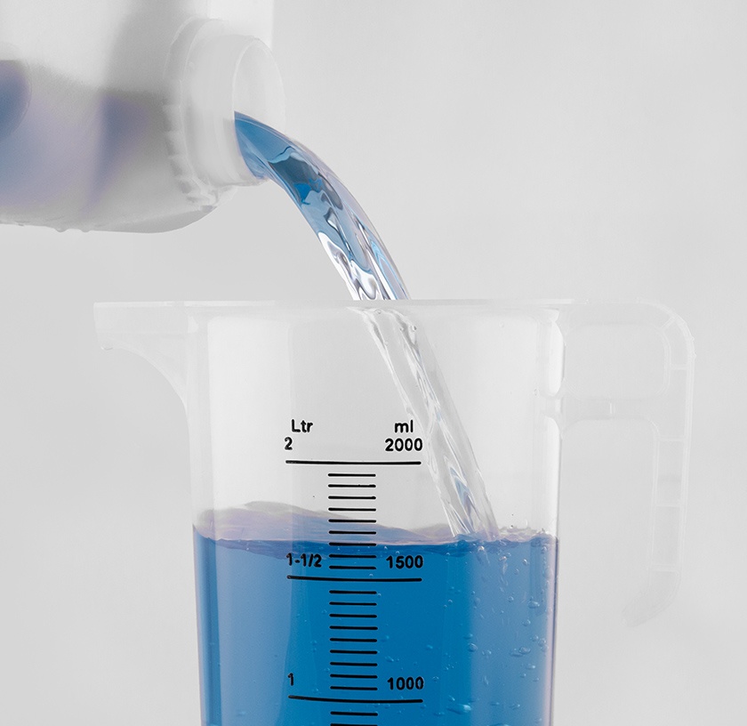 pouring liquid into a two litre jug
